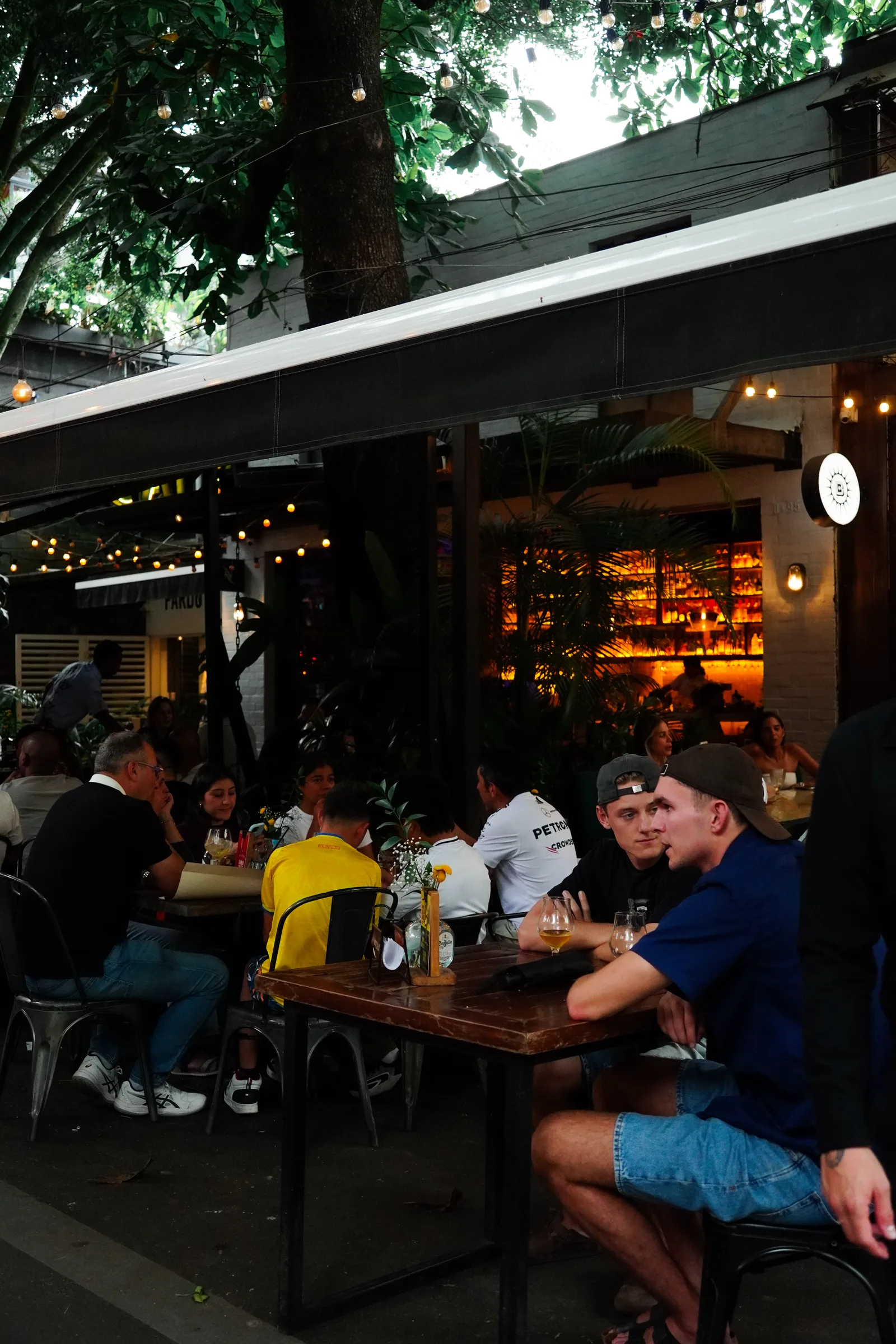 An established restaurant patio in Provenza, El Poblado, at night