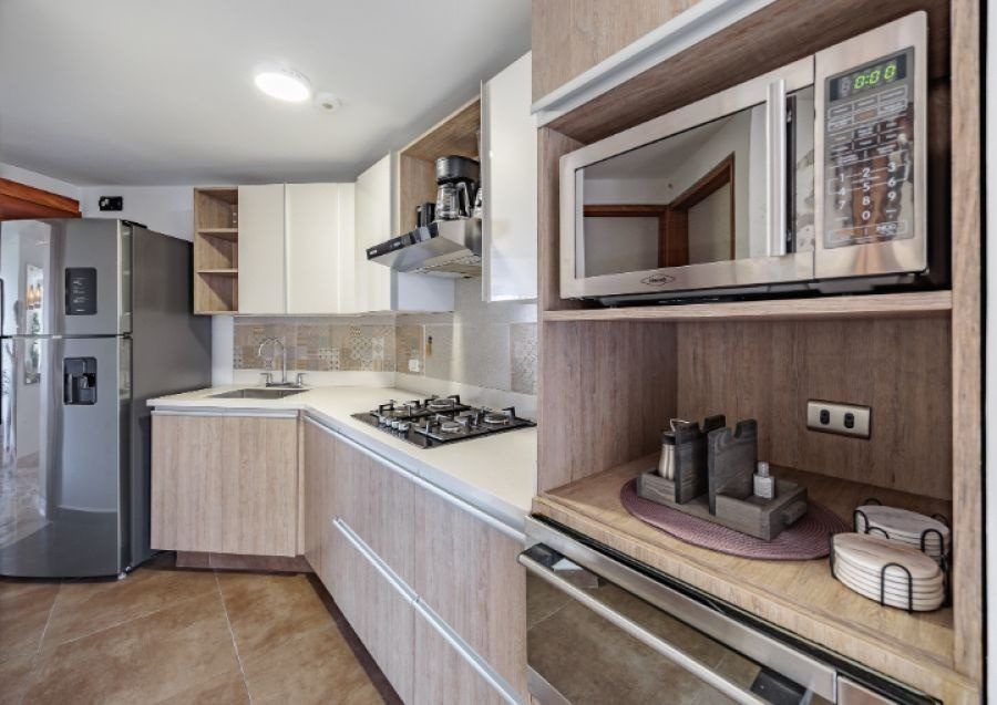 Kitchen with microwave nook at Balcony apartment, Medellin
