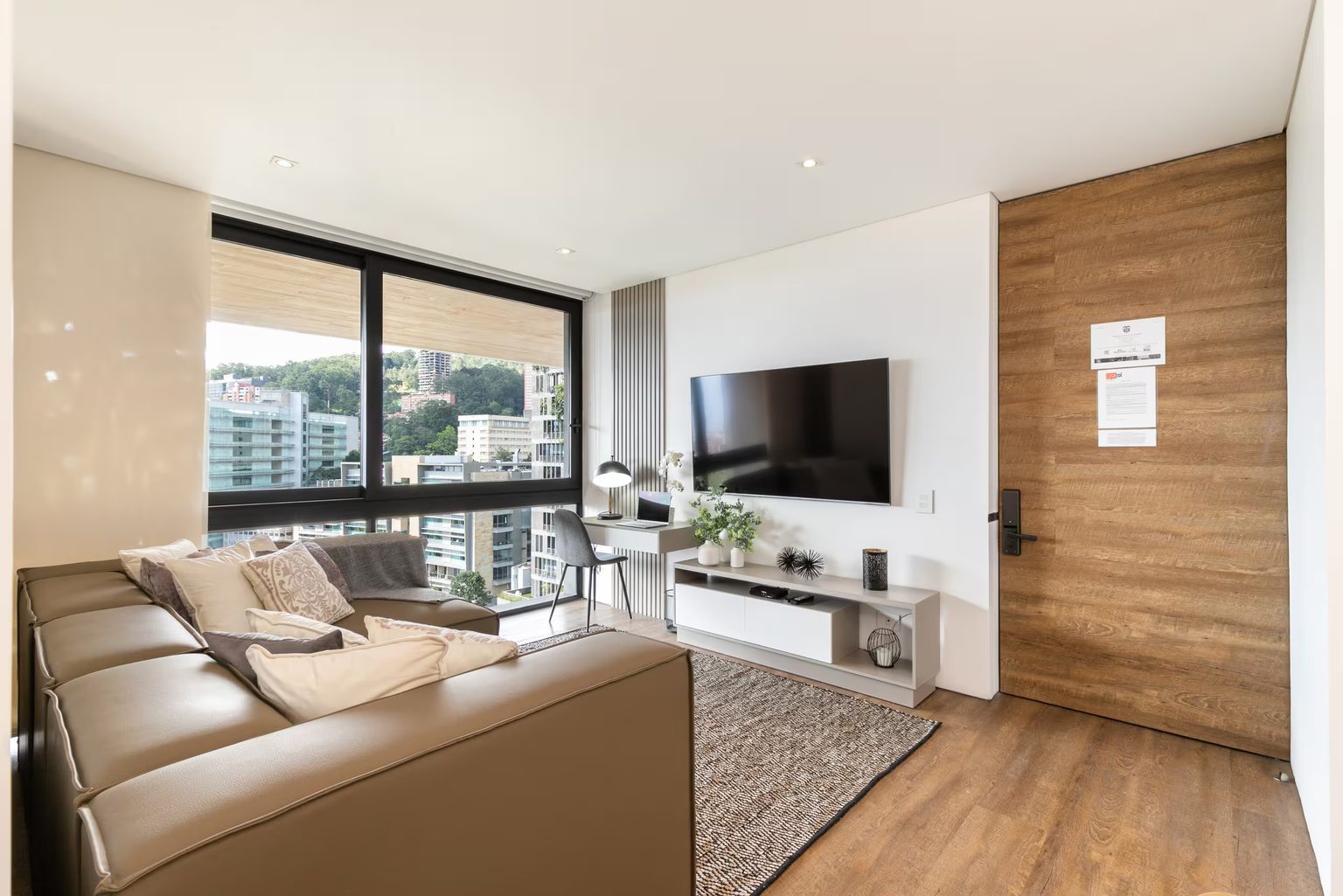 Living area with sofa and TV at Energy 1201, Medellin