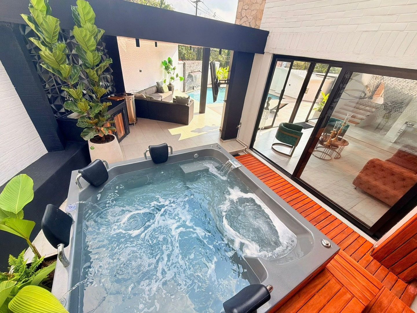 Jacuzzi beside the terrace at Pool House, Medellin