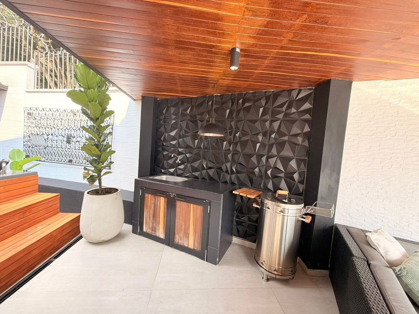 Outdoor social area at Pool House, Las Palmas