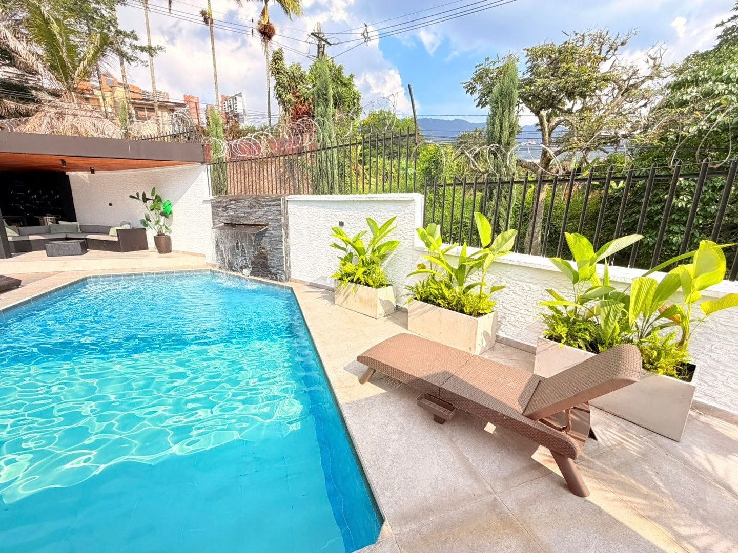 Pool with green hills view at Pool House, Medellin
