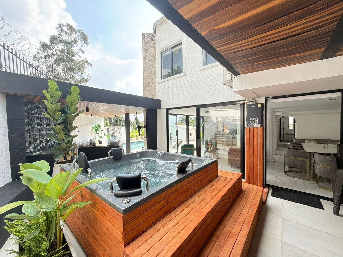 Jacuzzi on a wooden deck at Pool House, Las Palmas
