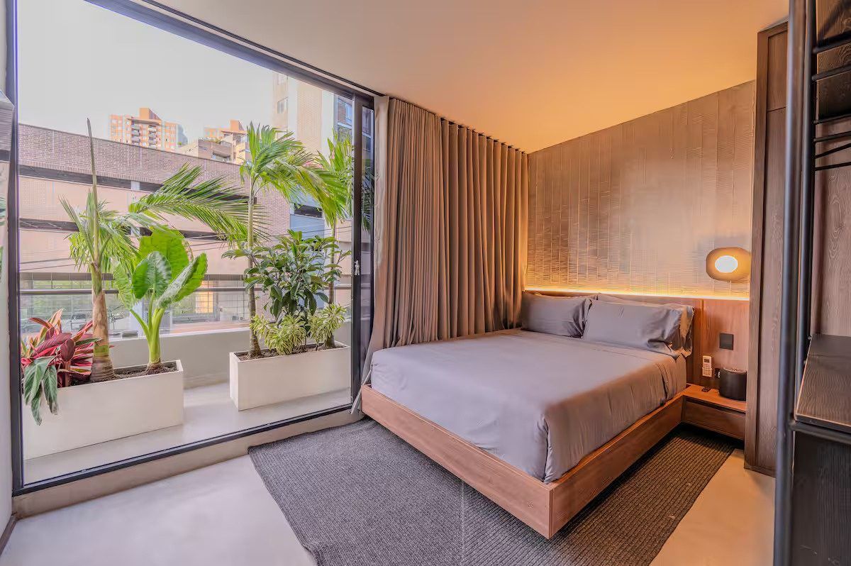 Bedroom with terrace views at Provenza 3, Medellin