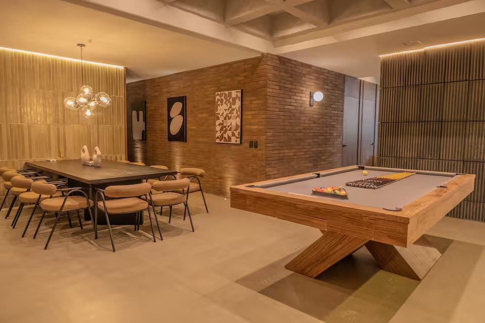 Dining table and billiards table at Provenza 3 villa, Medellin