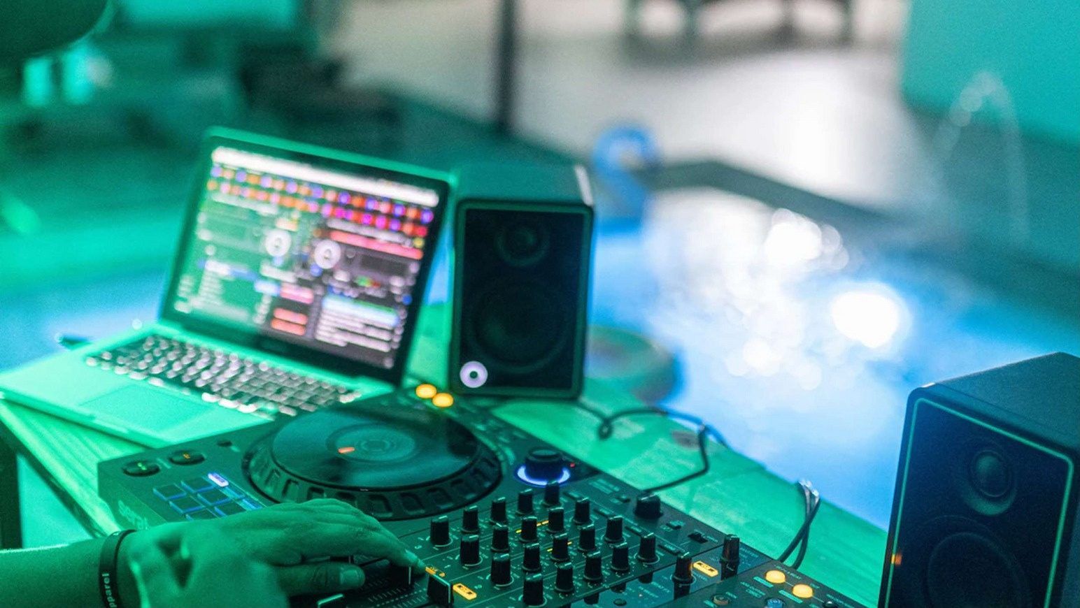 DJ equipment in the party area at White Mansion, Medellin