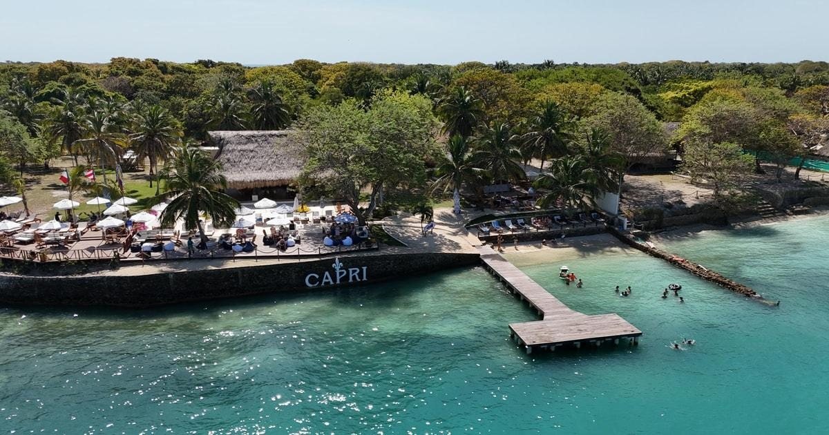 Aerial view of Capri Beach Club with its pier, beach and turquoise water in the Rosario Islands, Cartagena
