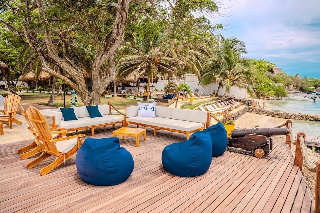 Capri Beach Club lounge deck by the turquoise water, Rosario Islands