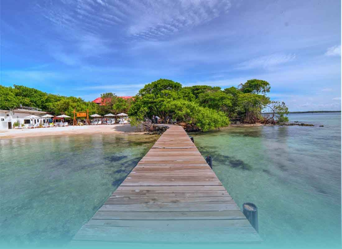 Wooden pier leading to the beach at Pao Pao Beach Club, Rosario Islands